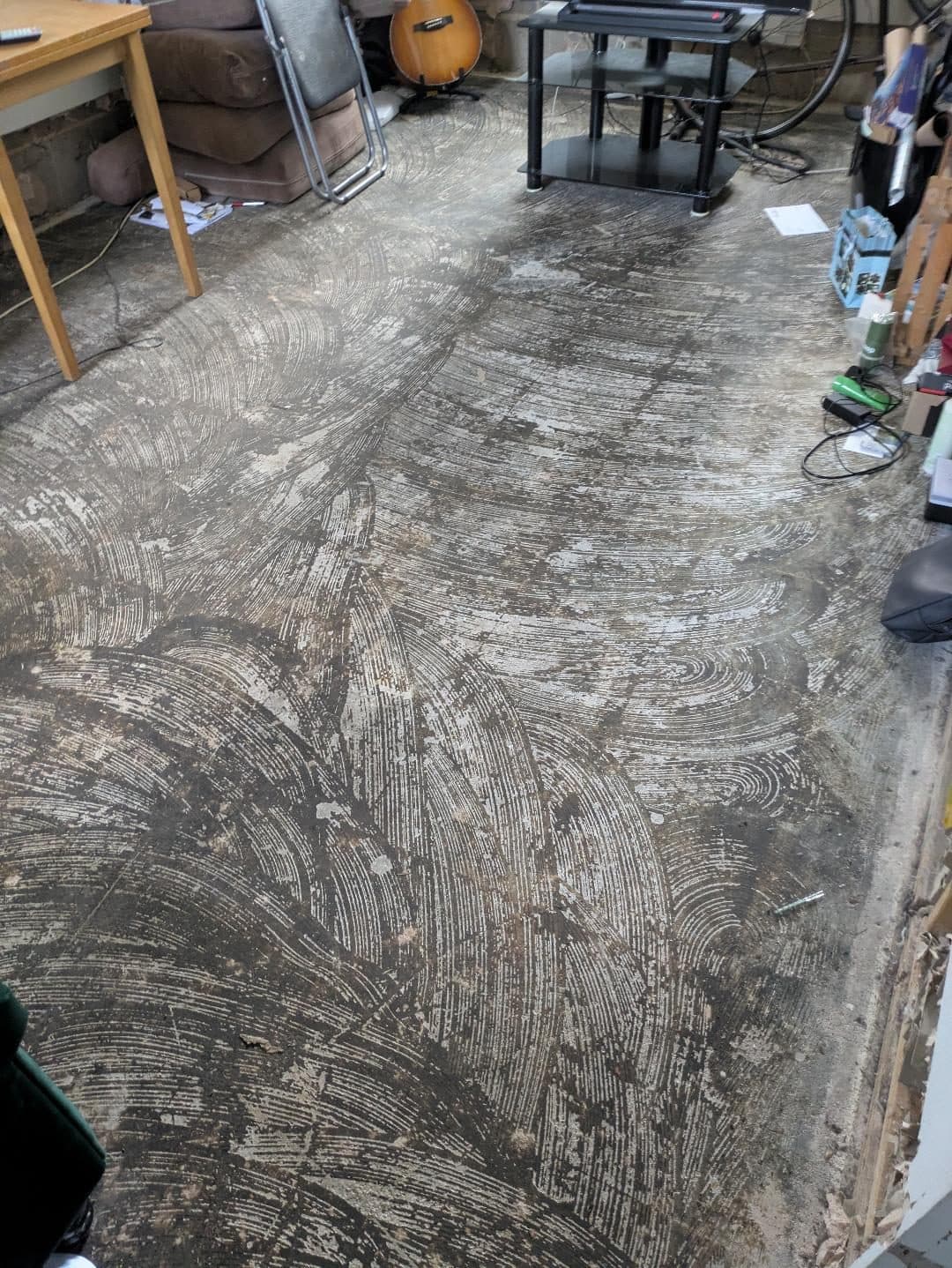 Full Property Refurbishment in Hammersmith: The old floor covering lifted in the living area, adhesive left behind