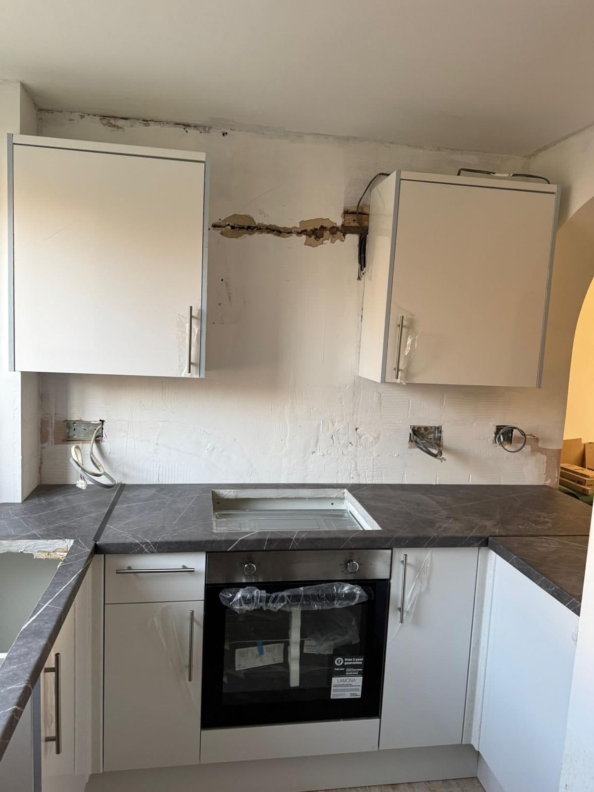 Full Property Refurbishment in Hammersmith: The worktop cut out for the sink, oven below