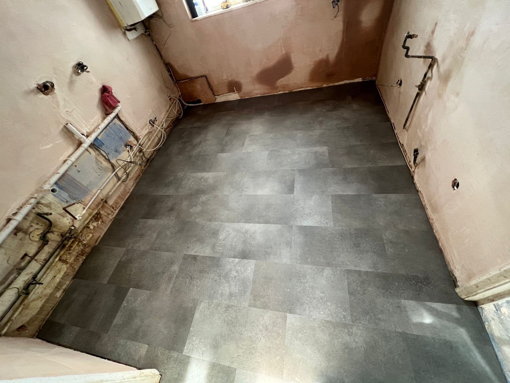 Navy Shaker Kitchen in Mayfair: New flooring down over the levelled subfloor