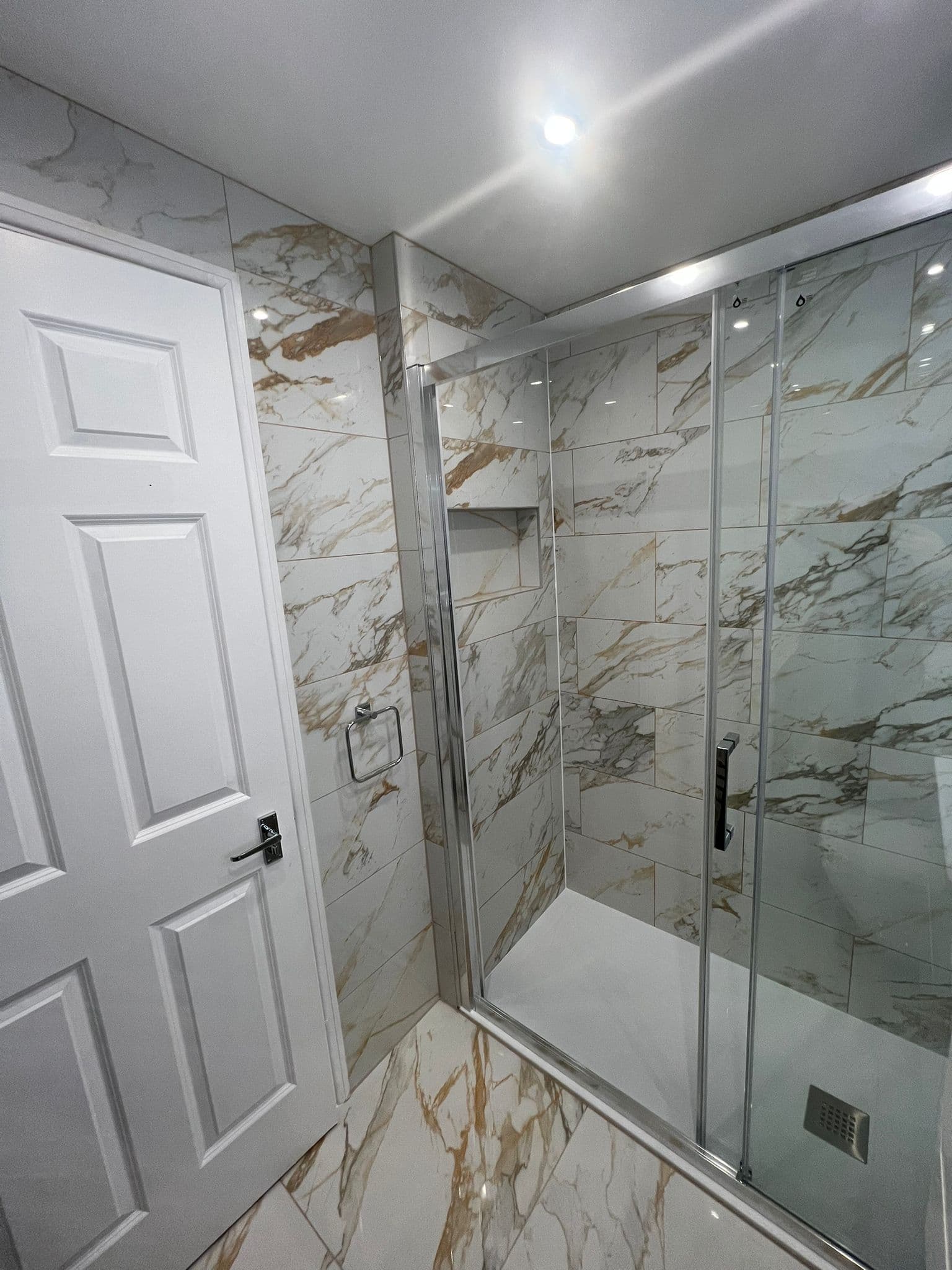 Walk-in Shower Room in Peckham: The walk-in enclosure with its finished niche