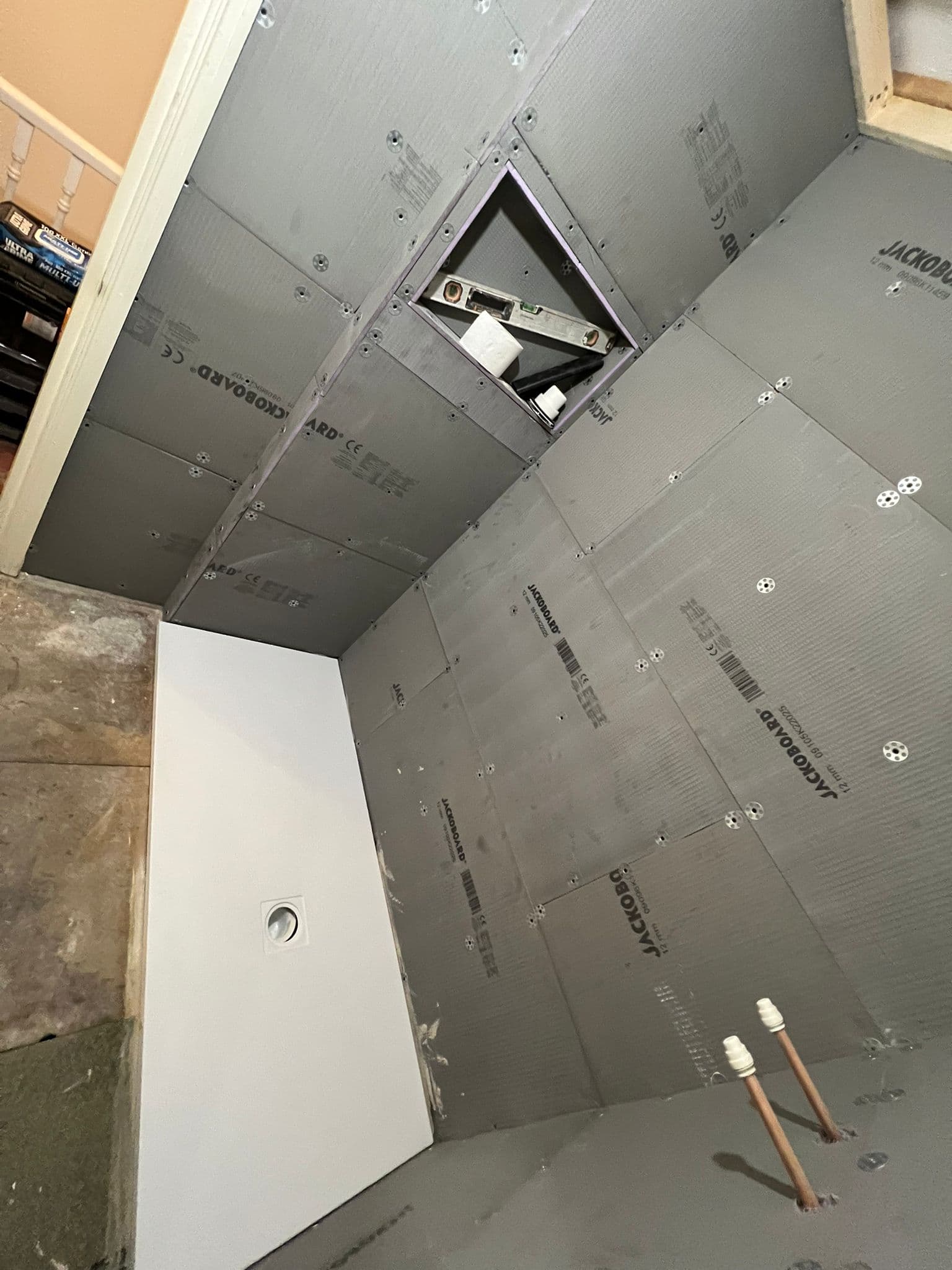 Walk-in Shower Room in Peckham: Shower area boarded and tanked, tray in and the niche formed