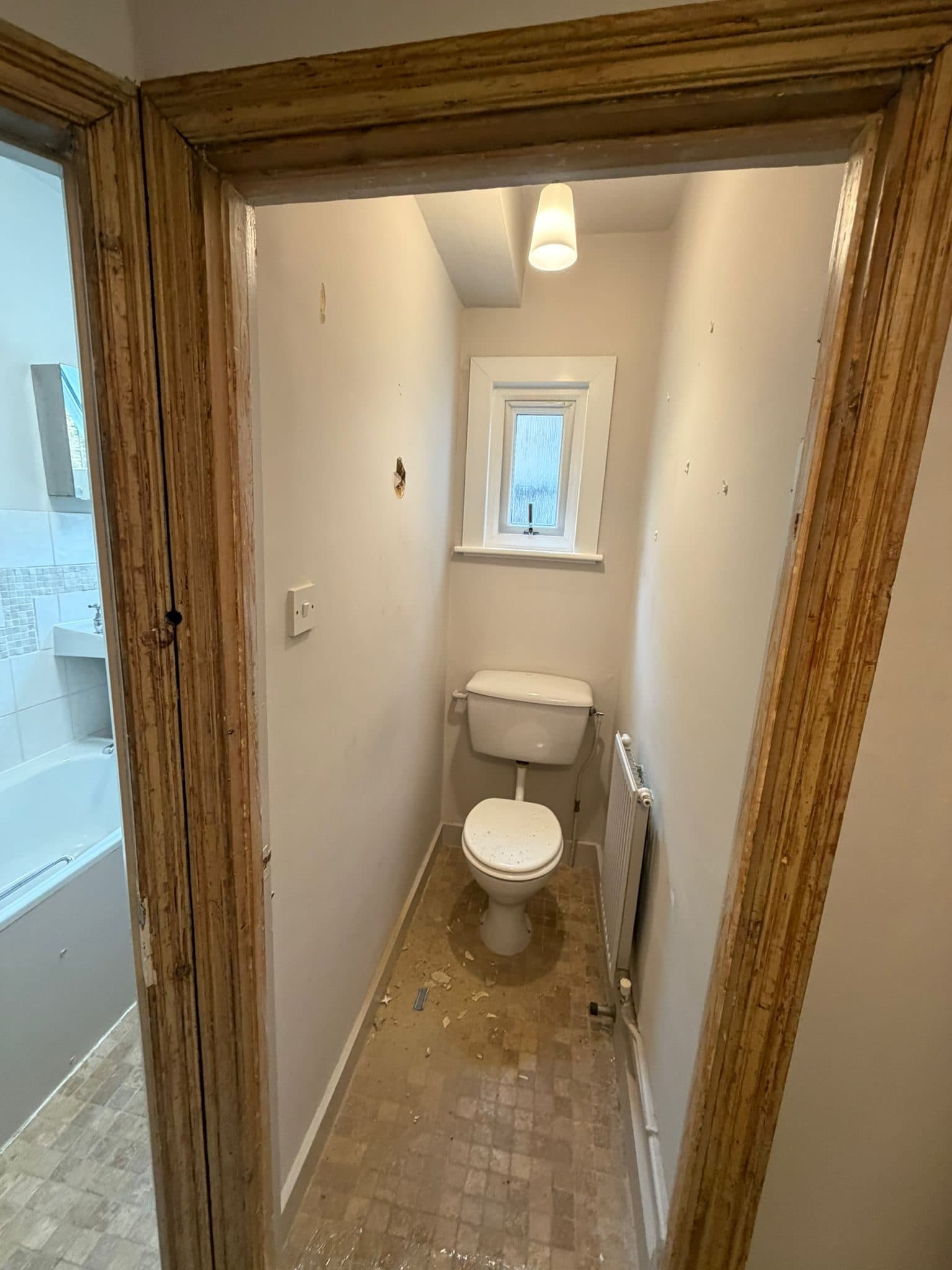 Bathroom Layout Transformation in Tooting: The toilet in a narrow compartment of its own