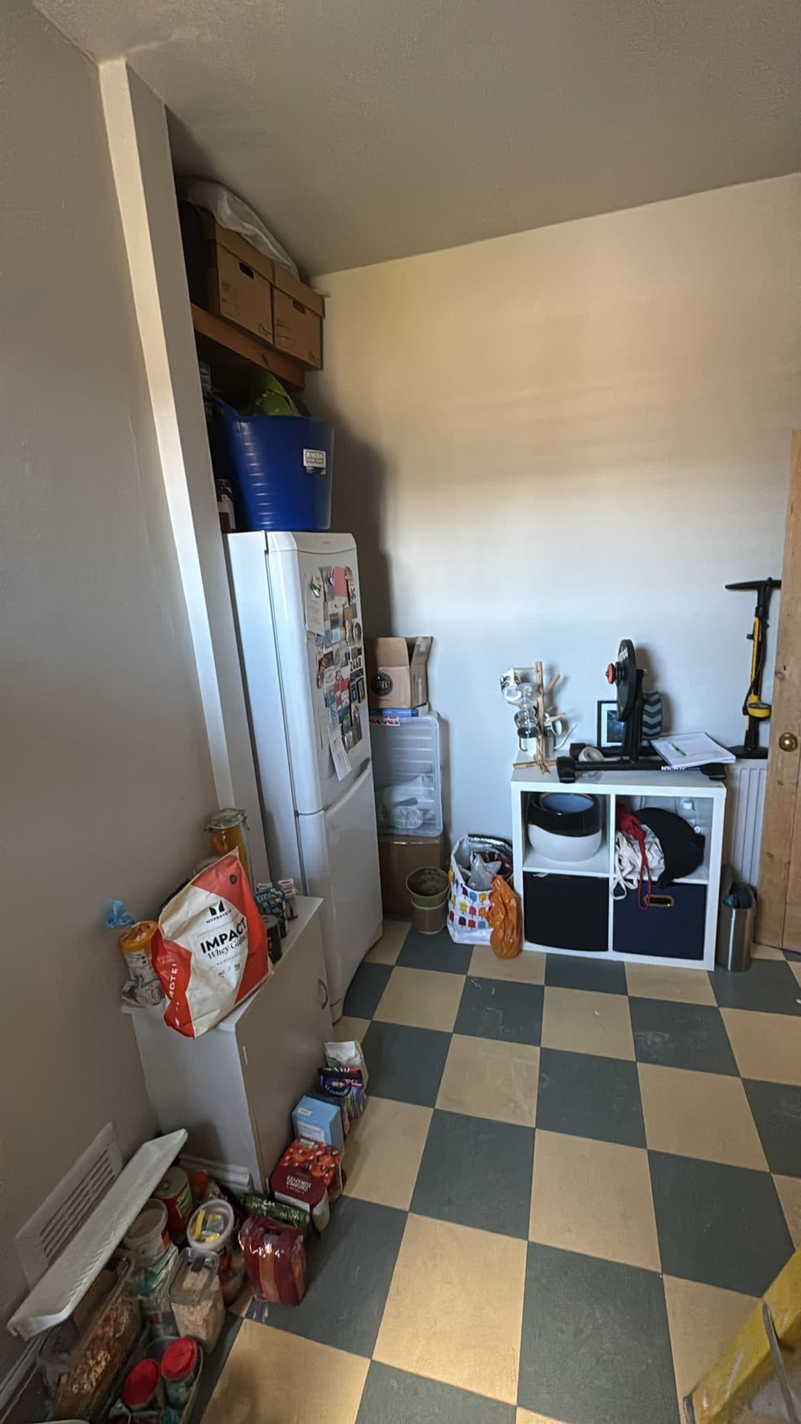 Kitchen Renovation in Tooting: The far end of the room, with the fridge freezer against the wall