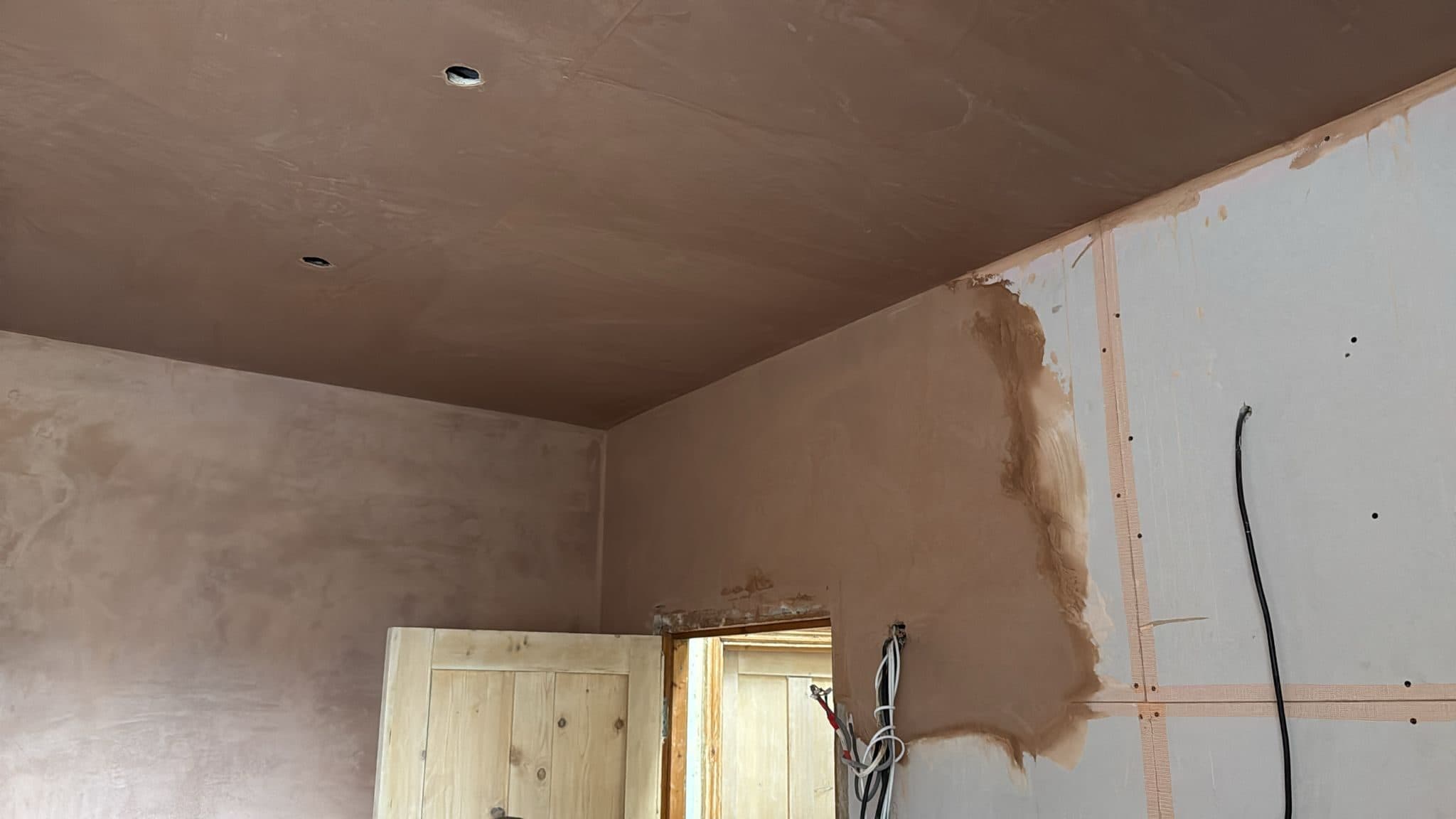 Kitchen Renovation in Tooting: Walls and ceiling freshly plastered, with cut-outs for the downlights
